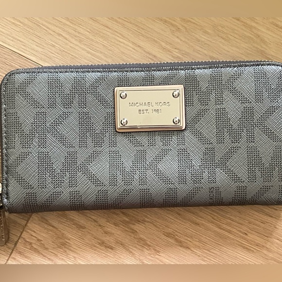 Michael Kors Handbags - Michael Kors Metallic Gray Wallet with Gold Plate